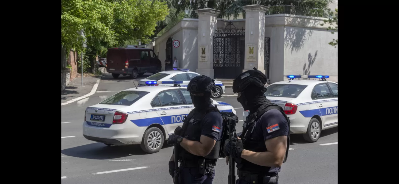 Serbian police officer injured by crossbow attacker who was then killed.