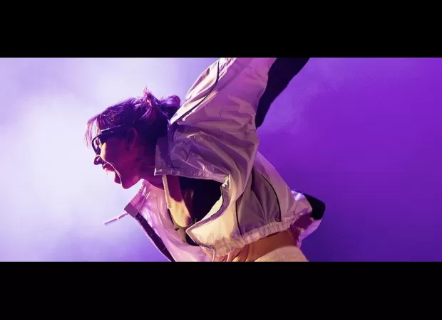 Spice Girls member surprises fans by joining electronic music group Orbital, causing excitement.