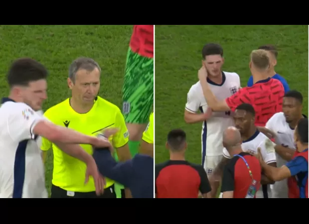 England player Rice angered by Slovakia manager's shove after Euro 2024 match, teammates intervene to calm him down.