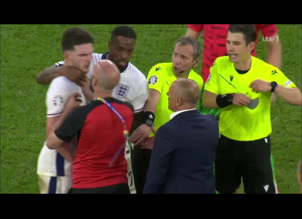 Slovakia coach criticizes England's use of Declan Rice and comments on ongoing controversy.