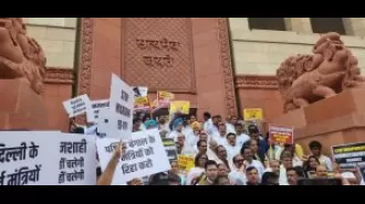 Protest against government by INDIA bloc MPs for misusing agencies to silence opposition.