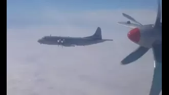 Nato jet intercepts Russian spy plane in tense moment.