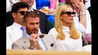 David Beckham and Katherine Jenkins are sitting very close despite rumors of an affair and previous awkward interactions.