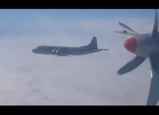 Nato jet intercepts Russian spy plane in tense moment.