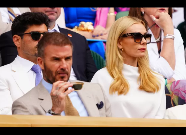 David Beckham and Katherine Jenkins are sitting very close despite rumors of an affair and previous awkward interactions.