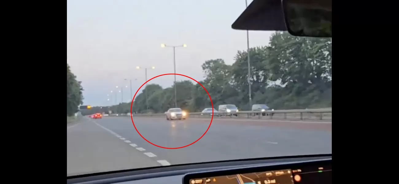 A reckless Audi driver races in the wrong direction on a highway.