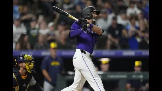 Rockies beat Brewers with Cave's 10th-inning single, first back-to-back wins since May.