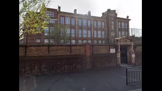 A head teacher received £100,000 after being fired for tapping a toddler's hand, deemed as an 