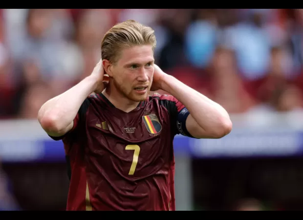 A journalist reacts to Kevin De Bruyne's insult towards him following Belgium's defeat in Euro 2024.