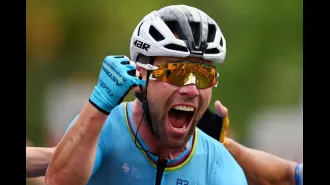 Cavendish celebrates after setting new record for most Tour de France stage victories.