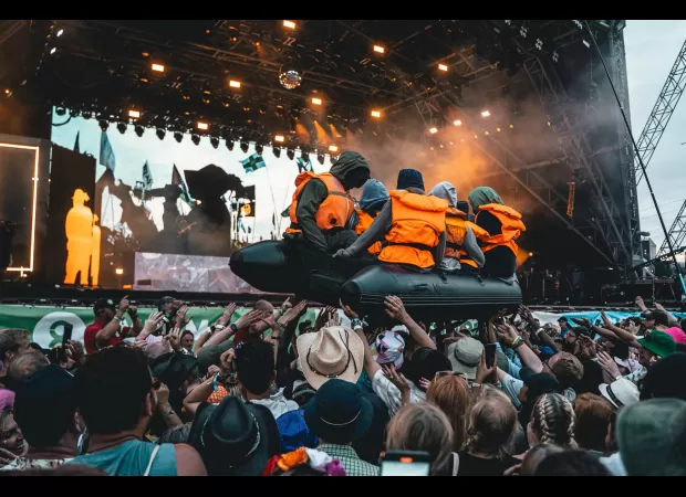 Street artist Banksy responds to criticism from the home secretary about his controversial Glastonbury boat artwork.