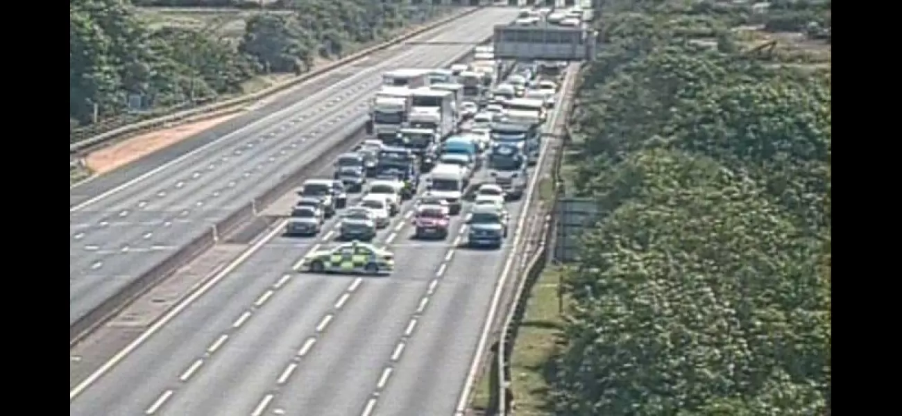 Highway shut in both ways due to 'law enforcement situation'.