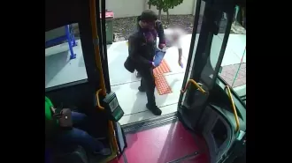 Police looking for suspect who pushed elderly man to ground while getting on bus.