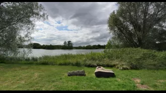 A police dog died while searching for a suspect in a country park who was wanted for attempted murder.