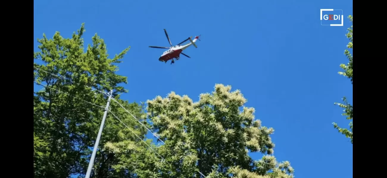 Woman falls off ski lift while trying to save her life after being dragged over cliff by skiing accident.