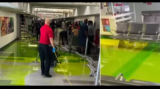 Airport ceiling leaks green liquid, causing travel disruptions during Fourth of July.