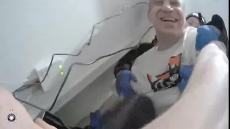 Police officer attacked by man with knife while trying to make an arrest, man found the situation amusing.
