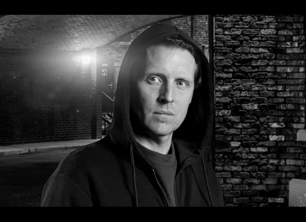 Nathan from Corrie seeks revenge from behind bars as Sarah's fear grows.