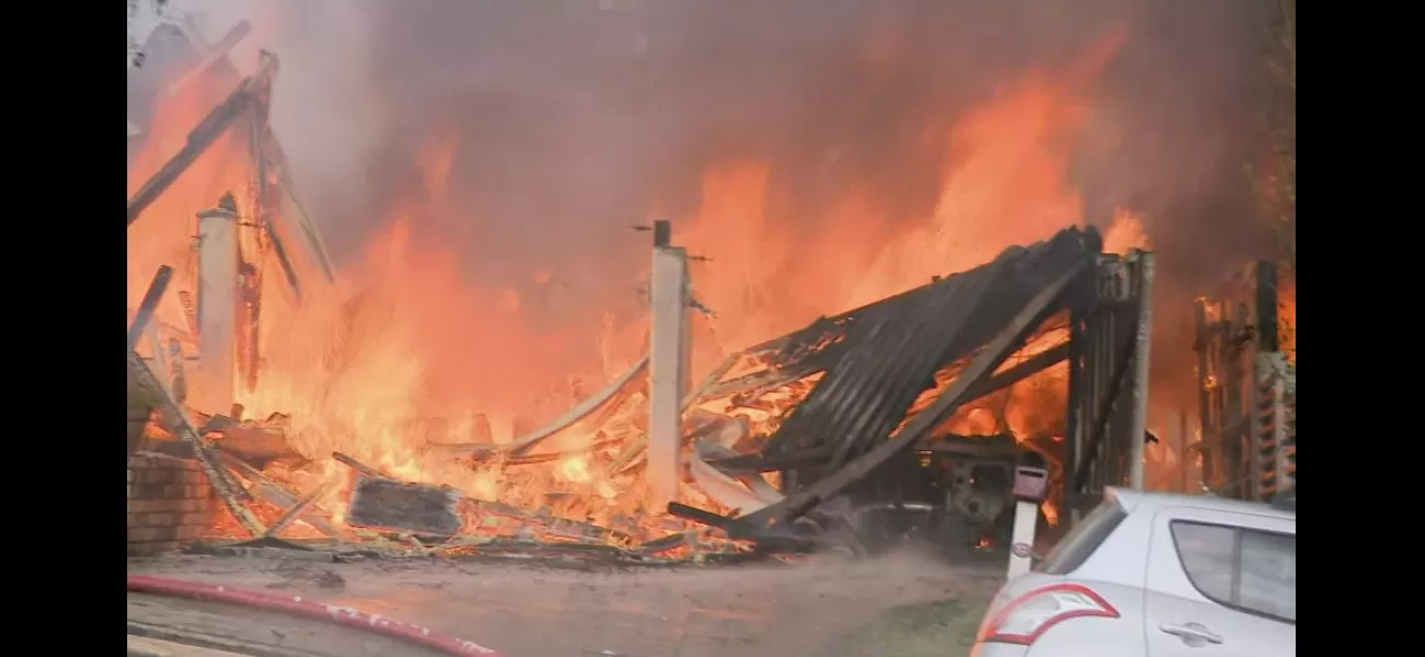 A huge fire ravages three houses in Brisbane, causing massive destruction.