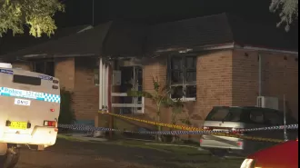 A deadly house fire in Sydney's western region leaves three children dead and a man under arrest.