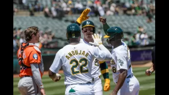 The Athletics dominated the Orioles with two 3-run homers from Rooker and Schuemann in a 19-8 victory.