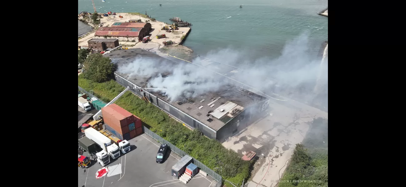 A massive fire has shut down a major highway, causing major disruptions for drivers.