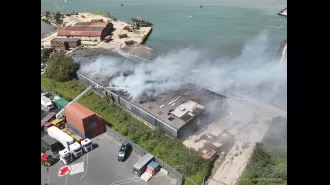 A massive fire has shut down a major highway, causing major disruptions for drivers.