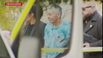 A woman is facing charges after a man's body was discovered in a home in Adelaide.