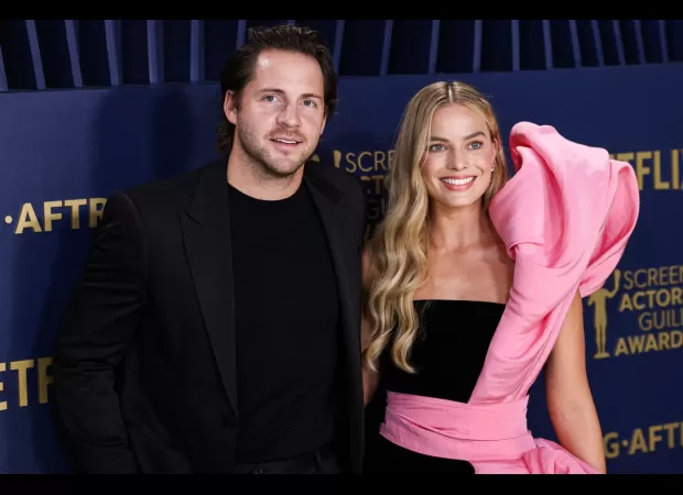 Actress Margot Robbie is reportedly pregnant with her first child, expecting with her husband Tom Ackerley.