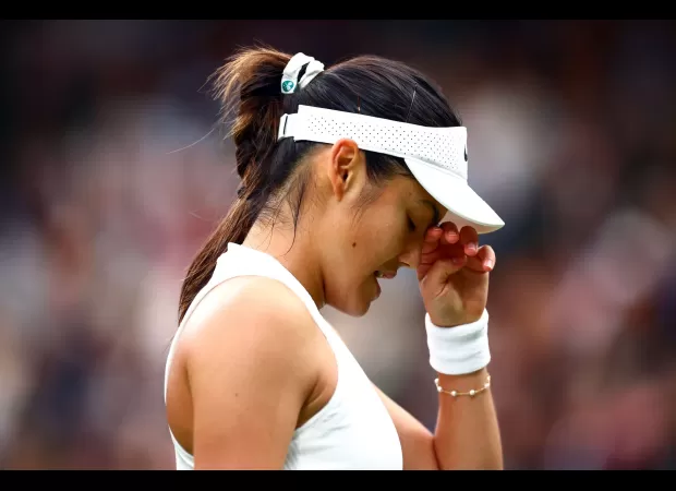 Emma Raducanu suffers loss at Wimbledon to Lulu Sun, ending her run at the tournament.