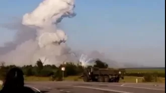 Russian officials promise retaliation following destruction of warehouse caused by Ukrainian drone strike.