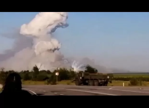 Russian officials promise retaliation following destruction of warehouse caused by Ukrainian drone strike.