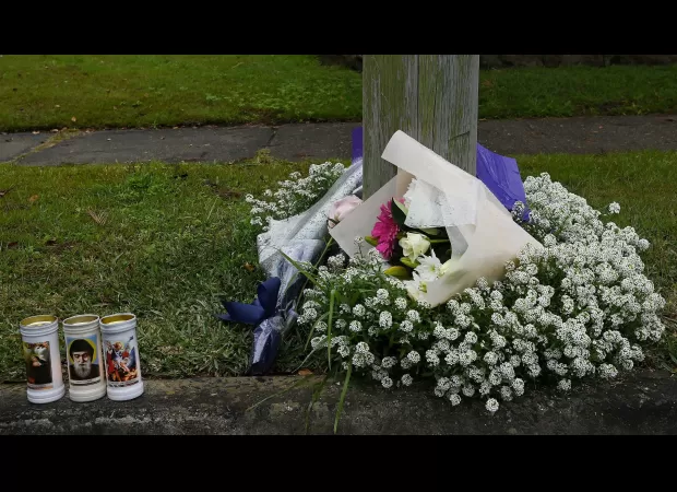 Mourning the loss of three children with heartfelt tributes at the home they passed away in.