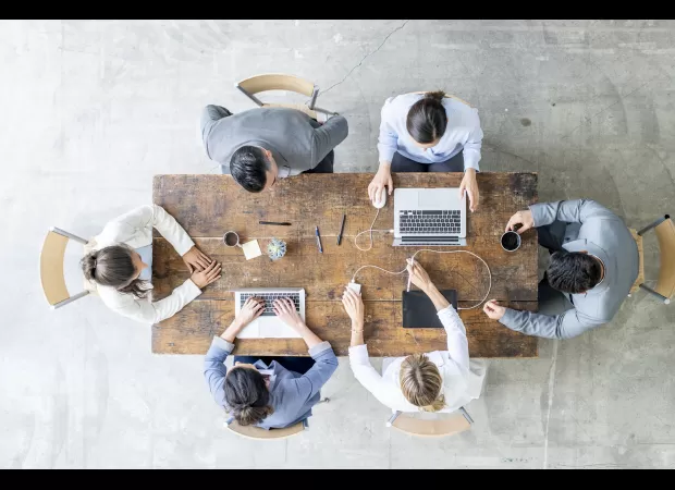 Employees work four days, author prefers this schedule and will not return to five days.