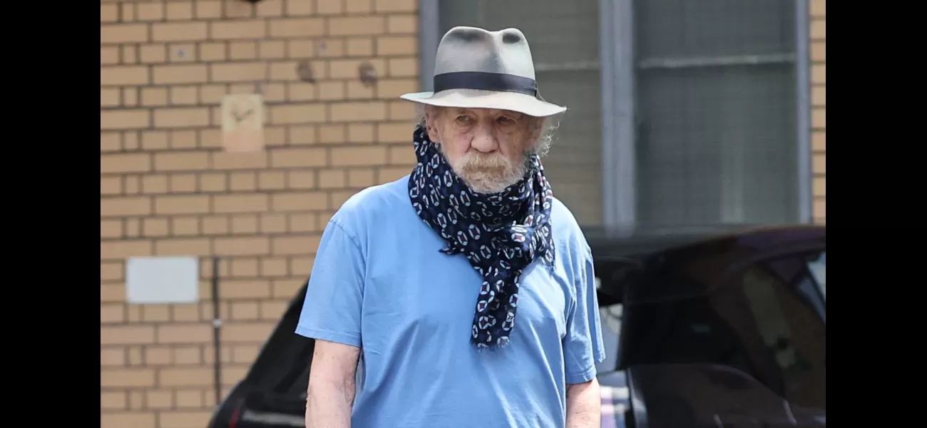 Actor Ian McKellen wears scarf to conceal neck brace following fall from west end stage.