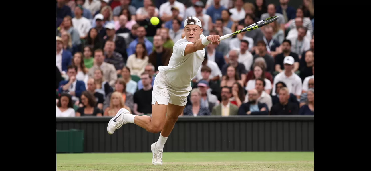 Holger Rune accidentally hits a ball boy during a match against Novak Djokovic at Wimbledon.