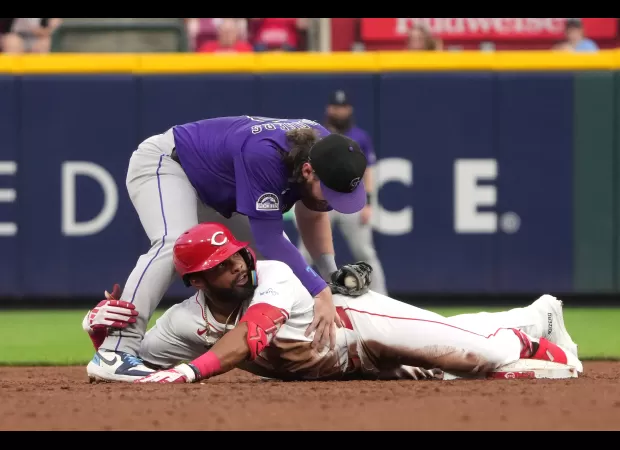 Rockies' bats fail to show up once again, resulting in a 6-0 defeat by the Reds.