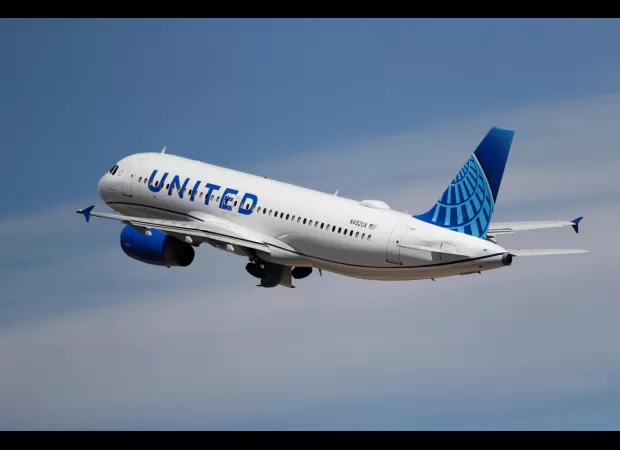 A United Airlines plane successfully lands at Denver International Airport despite losing a wheel during takeoff.