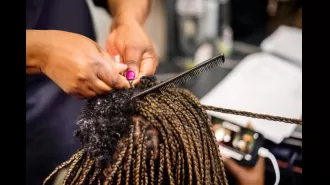 City law stops African braid shop from opening, causing significant losses for black business owner in South Fulton.