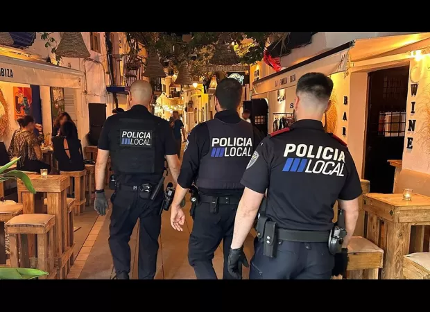 Two British citizens were taken into custody in Ibiza after a tourist was robbed of a watch worth £105,000.