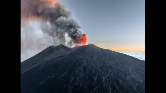 Travel chaos caused by eruption of Mount Etna prompts red alert.