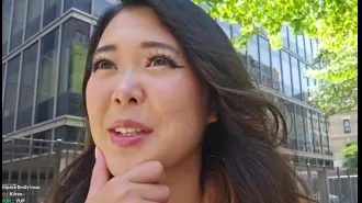 A person named Emily crashes into a police car while recording themselves riding a bike.