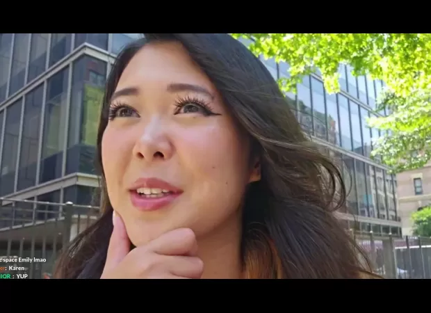 A person named Emily crashes into a police car while recording themselves riding a bike.