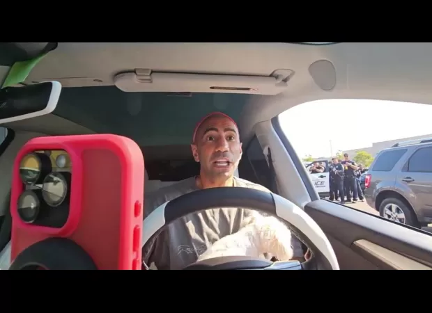 Famous streamer gets popular when swarmed by armed cops.