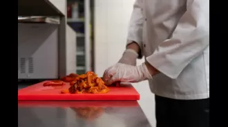 A chef from Ghana apologizes for using a fake Guinness World Record certificate.