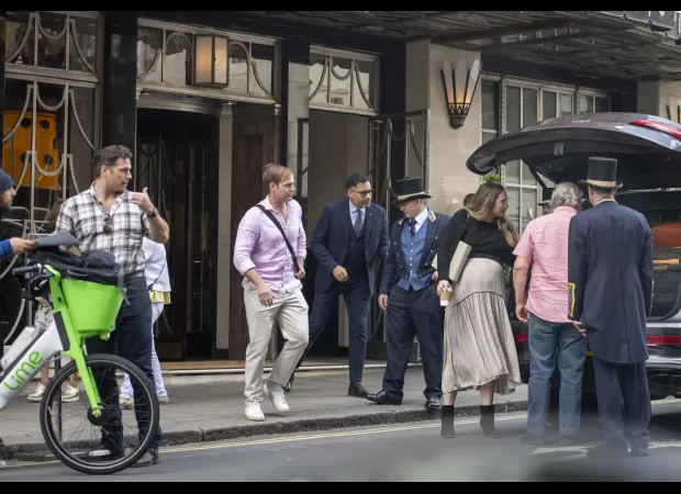 Superman star Henry Cavill and his girlfriend with a baby on the way spotted in London.