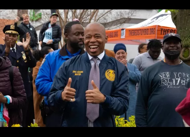 Mayor Eric Adams introduces NYC's first official trash bin pickup program, unveiling a revamped appearance for city streets.