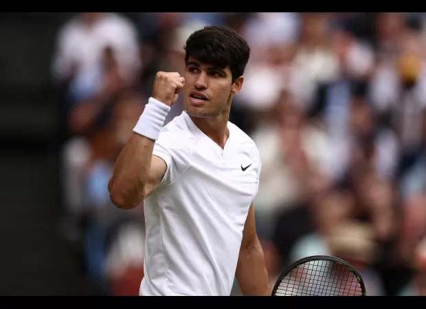 Spanish tennis player Carlos Alcaraz advances to Wimbledon final, moving closer to a rare accomplishment in the sport.