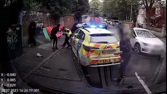 Police officer randomly attacked, stabbed in neck by passer-by in shocking moment.