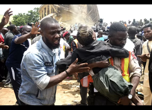 22 children die as school building collapses during class.